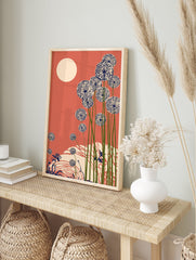 Illustrative coral dandelion wall art print with blue and cream seed puffs, green stems, and a cream sun on a coral background. - Image 3