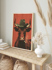 Cowboy bull smoking poster wearing a hat against a reddish-orange background, with smoke from the cigarette. - Image 4