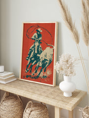 Cowboy Rodeo poster depicting a cowboy on horseback actively roping a bull, in a vintage graphic art style with red, teal, and beige colors. - Image 4