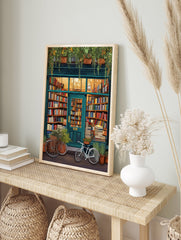 Illustrated cozy bookstore poster with a teal facade, warm interior lighting, bookshelves, plants, and bicycles outside. - Image 4