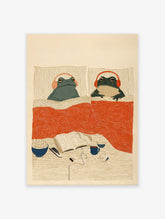 Illustrated Cozy Frogs in Bed wall art print featuring two frogs with headphones, popcorn, book, and mug on a nightstand.