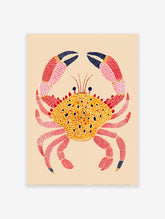 Colorful illustrated crab wall art print with a yellow spotted shell and pink spotted legs on a light beige background.