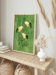 Japanese-inspired crane bird wall art illustration with orange fruit on a textured green, in an alternate framed mockup