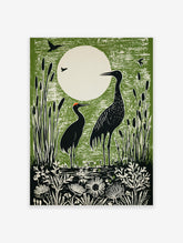 Green linocut print of two black cranes in a marsh with cattails and a large white moon in the background