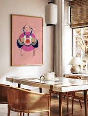 Illustrative crane wall art with two blue and white birds, golden wings, pink circle, orange sun on, in a styled room mockup