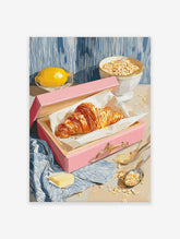 Croissant breakfast poster with a golden croissant in a pink box, fresh lemon, and a bowl of oats on a table.