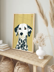 Illustrative Dalmatian dog portrait art print with black spots, amber eyes, and Japanese text, in an alternate framed mockup