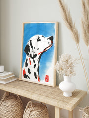Illustrative watercolour print of a white Dalmatian dog with black spots and red accents, in an alternate framed mockup