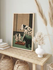 Illustrative print of two Dalmatian dogs with black spots playing chess on a green floor, in an alternate framed mockup