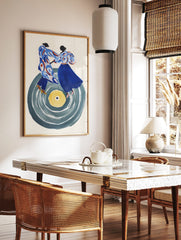 Abstract art print of two stylised figures dancing on a large grey vinyl record with a yellow, in a styled room mockup