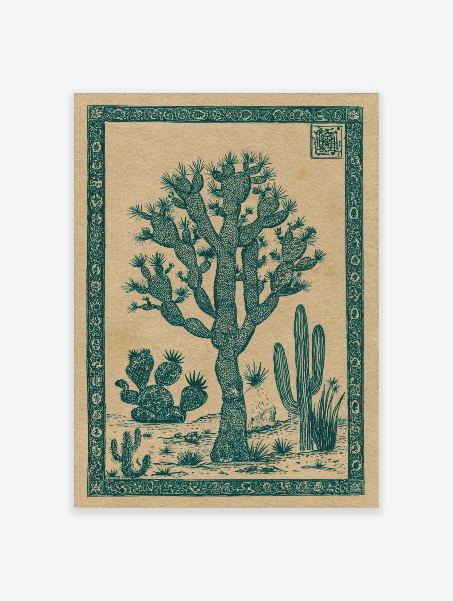 Illustrative desert landscape wall art with a large Joshua tree, saguaro cacti, and an ornate border in dark teal on beige
