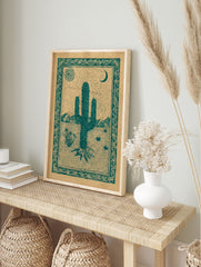 Desert cactus poster with a green illustration of a saguaro, sun with an eye, and crescent moon in a desert landscape. - Image 4