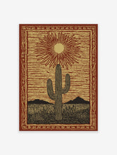 Desert cactus poster featuring a saguaro under a radiating sun in a linocut style, with mountains and plants in a red and gold desert scene.
