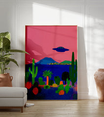 Surreal desert landscape poster with a pink sky, blue ocean, green cacti, and a dark blue UFO flying above a small town. - Image 3