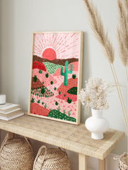 Illustrative desert wall art with pink and green hills, a red sun, and a tall green cactus in a Southwestern landscape. - Image 3