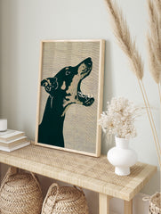 Graphic dark green Doberman dog head barking in profile on a beige lined background art print, in an alternate framed mockup