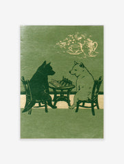 Illustration of a black dog and a white dog playing chess at a table with a tea set above, in green and cream tones