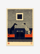 Illustrative print of a black dog and a spotted dog playing chess at a table, with a framed picture on the wall