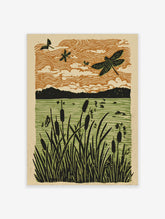 Linocut style art print of dragonflies flying over cattails in a marshland with an orange sky