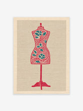 Stylized red and teal dress form wall art print on a textured beige background, featuring stripes and leaf motifs.
