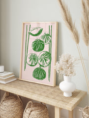 Green dumpling illustration poster on a light pink background with vertical lines, resembling chopsticks. - Image 3
