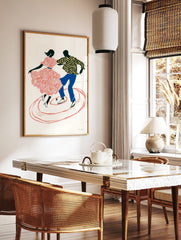 Illustrative print of two dynamic black silhouette dancers with red, blue, and yellow details, in a styled room mockup