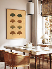 Eight stylized fan shapes in dark green and reddish-brown on a light beige background, arranged in, in a styled room mockup