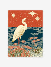 White egret bird standing in red spider lilies with blue water and a starry orange sky. Japanese egret wall art print.