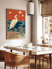 White egret bird standing in red spider lilies with blue water and a starry orange sky. Japanese egret wall art print. - Image 2