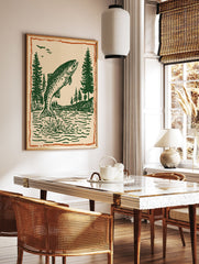Vintage fish wall art print showing a green fish jumping out of water with pine trees and birds under an orange border. - Image 3