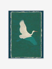 White crane with teal wings flying against a textured green background, framed by cream and blue borders