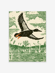 Linocut style print of a duck flying over a marsh with reeds and water, in green, cream, black, and orange