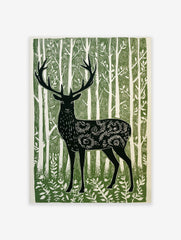 Illustrative green and white print of a forest stag with ornate body patterns amidst tall trees