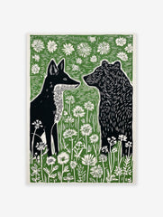 Black fox and bear in profile, surrounded by white wildflowers and green foliage, in a linocut art print