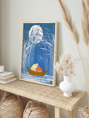 Japanese woodblock style art print of a frog and goldfish in a small boat under a full moon, in an alternate framed mockup