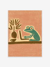 Teal frog at laptop with plant and coffee cup on peach background art print