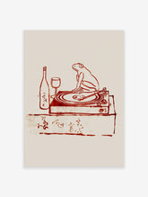 Reddish-brown illustration of a frog on a turntable with a wine bottle, glass, and Japanese script