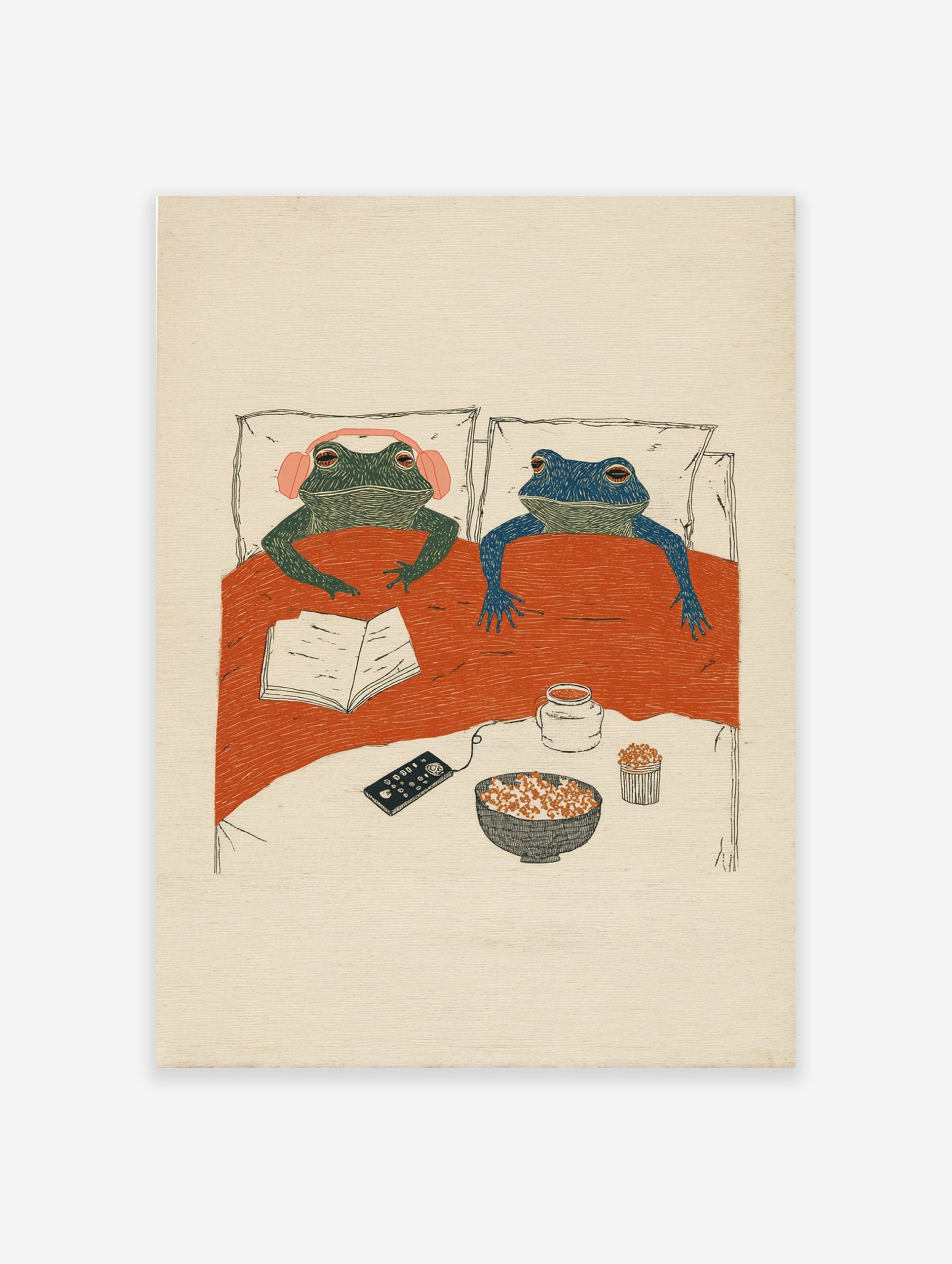 Whimsical frog wall art illustration of two frogs in bed with popcorn, a book, and headphones for a cozy night in.