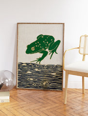 Green frog leaping over blue water on a woven tapestry with gold outlines - Image 2