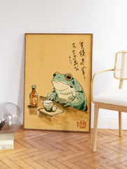 Japanese illustration of a frog sitting at a table with a bottle and cup, featuring calligraphy. Unique frog wall art. - Image 2