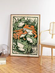 Vintage illustration print showing five green and orange frogs in a pond with reeds, in a woodcut style. - Image 2