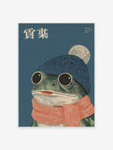 Whimsical frog wall art illustration with a frog wearing a blue beanie, white pom-pom, and orange striped scarf.
