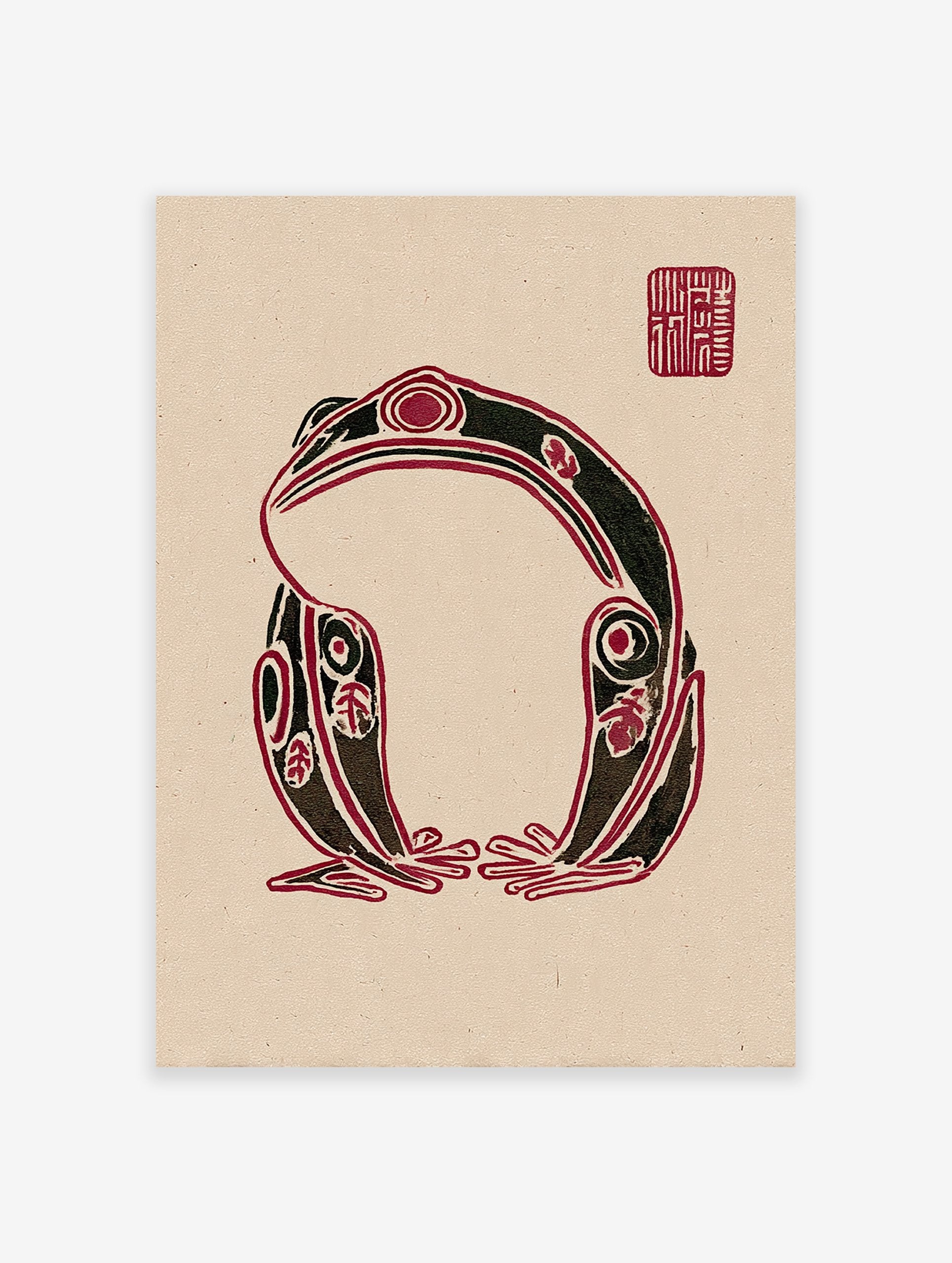 Stylized black and red frog wall art print in an indigenous folk art style on a beige background with a red seal.