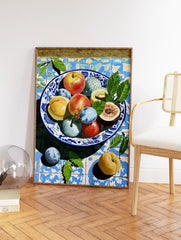 Colorful fruit still life painting in a blue and white bowl on patterned Mediterranean tiles with green leaves. - Image 2