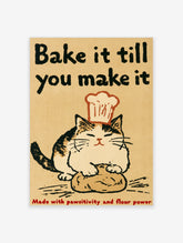 Tabby cat in chef hat on bread with text Bake it till you make it, humorous kitchen poster