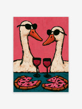 Playful wall art print of two geese wearing sunglasses, drinking wine, and eating pizza against a pink background