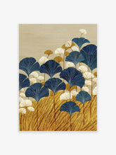 Stylized Ginkgo Leaf Wall Art with deep blue, white, and gold leaves on a textured beige background.