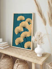 Ginkgo leaf botanical illustration with beige fan-shaped leaves and dark veins on a teal, in an alternate framed mockup