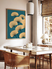 Ginkgo leaf botanical illustration with beige fan-shaped leaves and dark veins on a teal background, in a styled room mockup