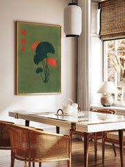 Botanical ginkgo leaves in dark green-blue and red on an olive-green background with red seals and, in a styled room mockup